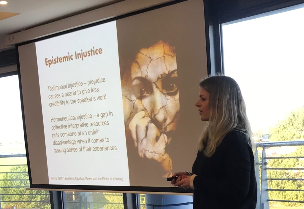 Jenna Breckenridge presenting a slide on Epistemic Injustice